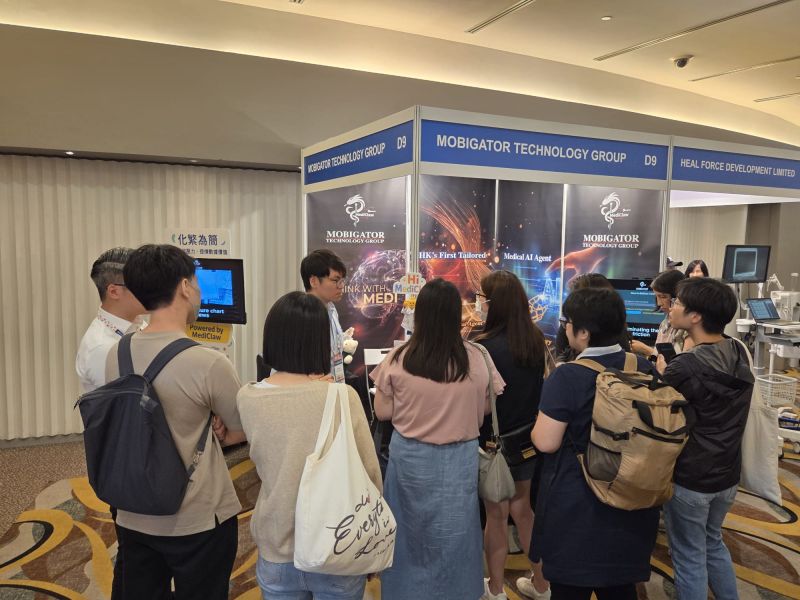 Visitors at the Mobigator MediClaw booth during the HA Convention